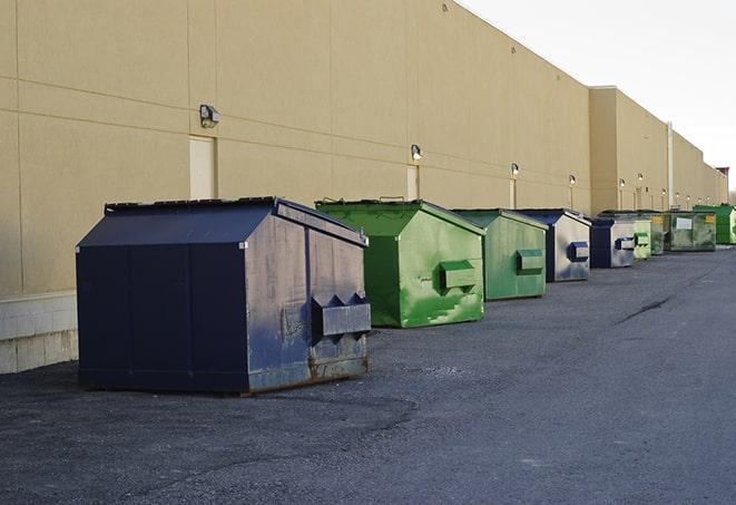 portable, green construction dumpsters serving as a container for scrap materials in Chinchilla, PA